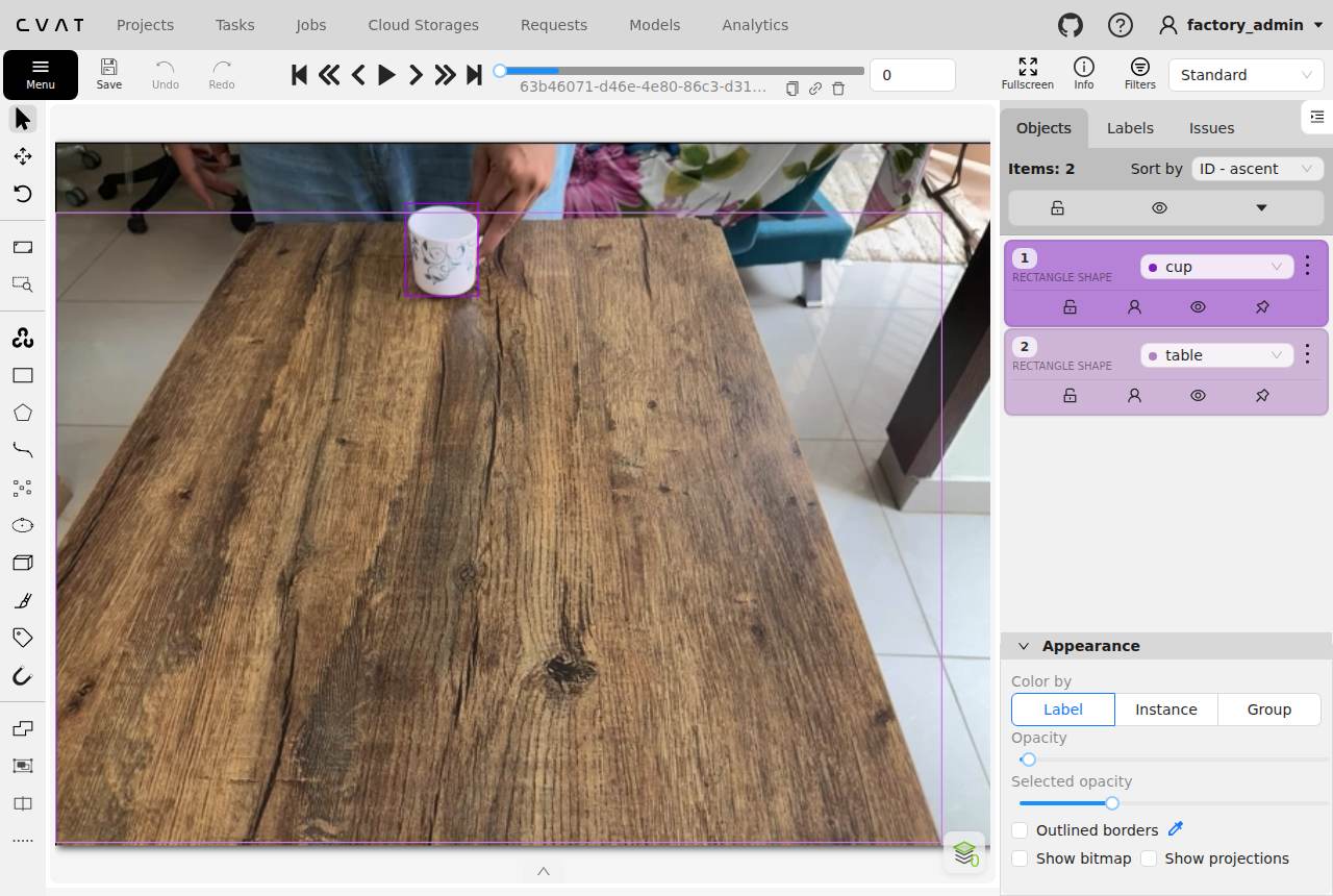 CVAT job canvas showing corrected boxes with the objects panel